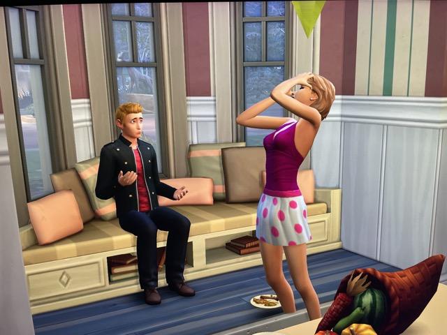 Hannah complains to Travis Scott in Sims 4