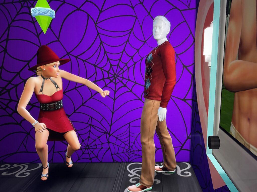Summer Holiday dances with her Travis Scott mannequin inside her basement in The Sims 4.